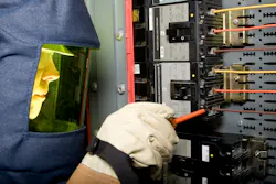 electrician in protective clothing electrician in protective clothing