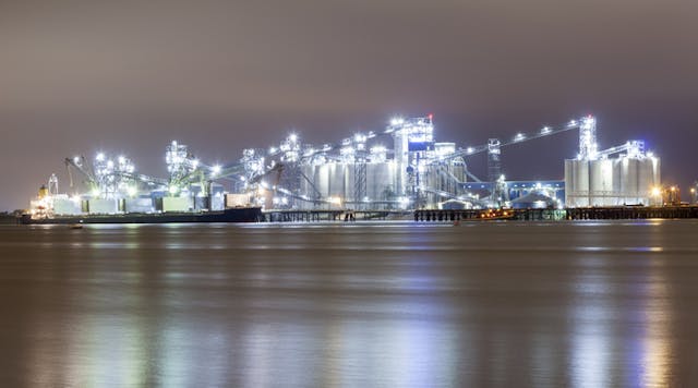 Refinery at the Mississippi River in Baton Rouge illuminated at night.