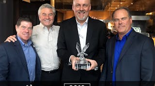 SATCO won an IES Supplier of the Year Award for its sales growth with the company over the past year. Pictured here at the presentation (left-to-right): Dan Gray, IES CEO and owner; Chuck Role, David Role Co.; Ron Schoffelmeer , SATCO&apos;s regional sales manager; and Bob Trolander, IES, VP - marketing and business development.