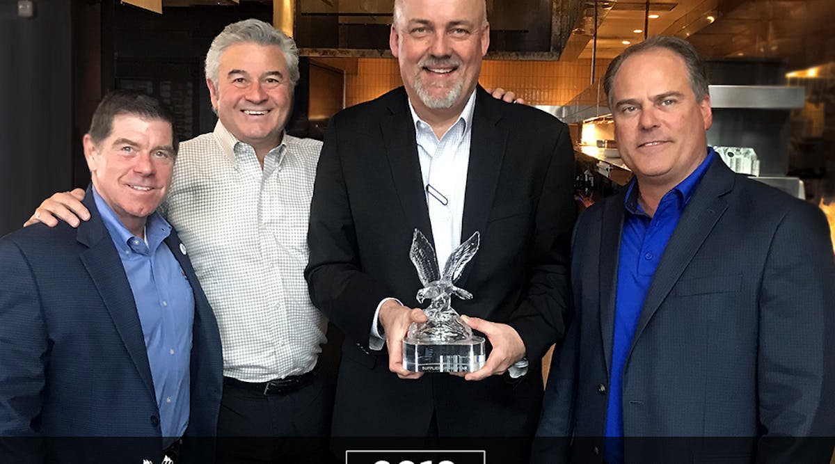 SATCO won an IES Supplier of the Year Award for its sales growth with the company over the past year. Pictured here at the presentation (left-to-right): Dan Gray, IES CEO and owner; Chuck Role, David Role Co.; Ron Schoffelmeer , SATCO&apos;s regional sales manager; and Bob Trolander, IES, VP - marketing and business development.