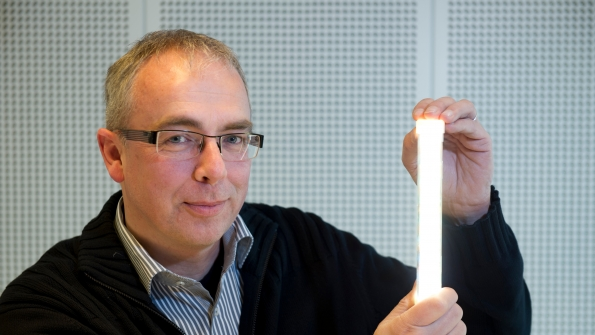 Coen Liedenbaum at Philips Research shows the first prototype TLED providing 200 lumenswatt