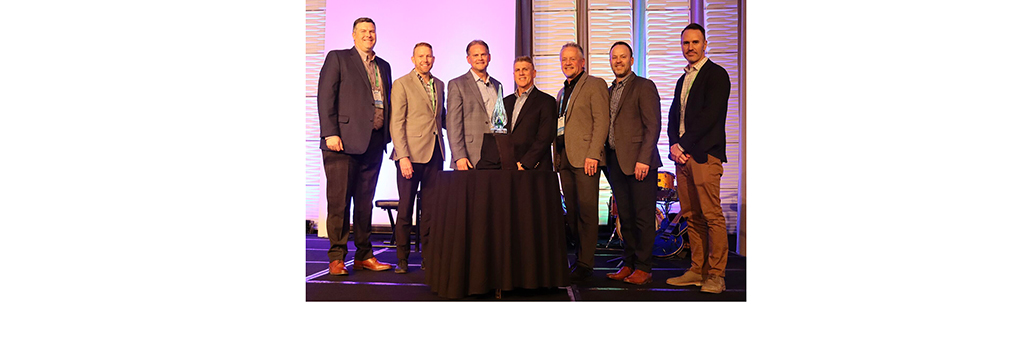 Winners of the 2021 NEMMY Partnership of the Year Award: Kris Haslam & the Lyle W. Williams Co. and Greg Janes and the Legrand team.
